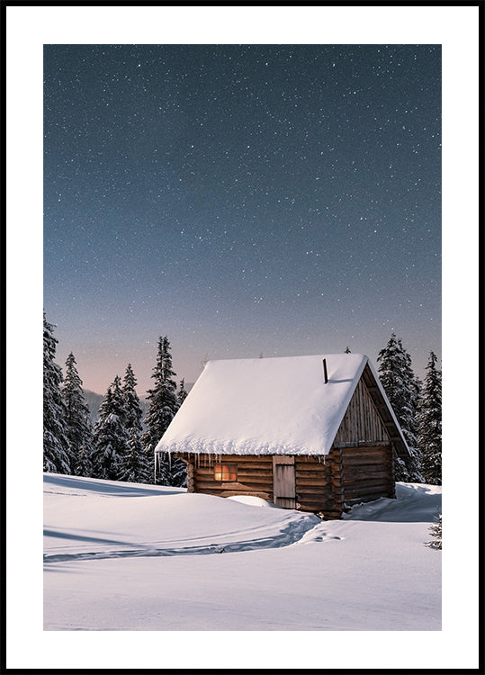 a cabin in the middle of a snowy field